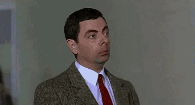 Rowan Atkinson looking guilty as Mr. Bean